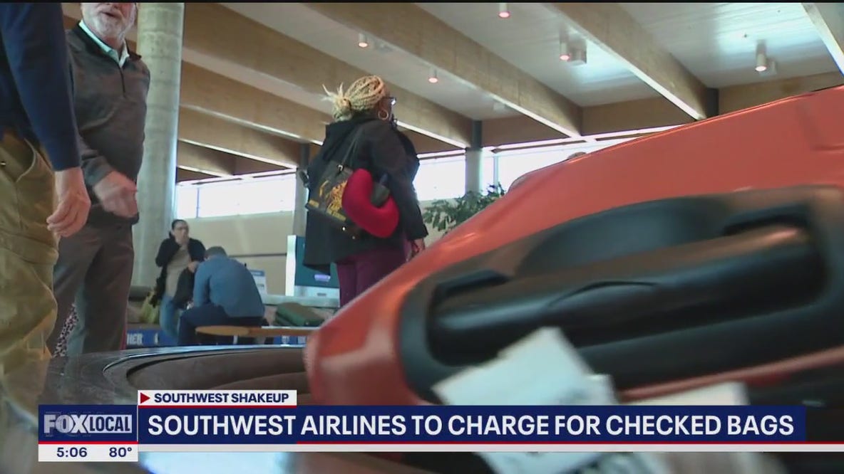 Southwest Airlines ends free checked bags